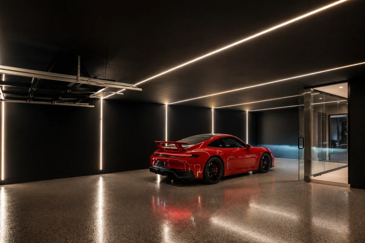 Sports car on a polished floor in a private showroom